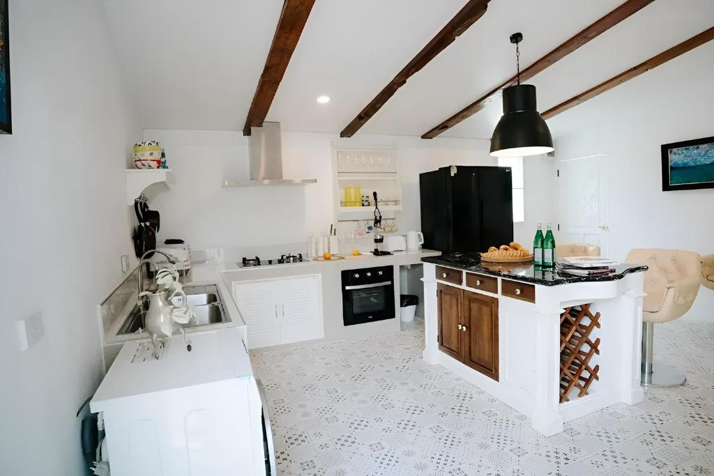 Kuchyň nebo kuchyňský kout v ubytování Villa Cavallo Chiangrai