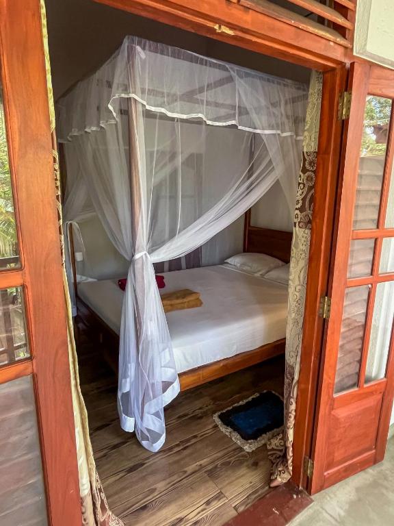 Letto o letti in una camera di Abraham Beach House