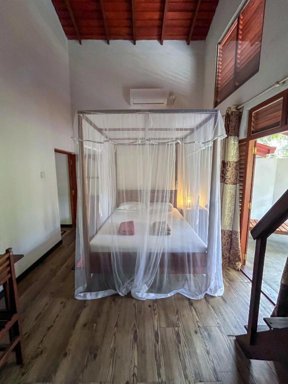 Letto o letti in una camera di Abraham Beach House