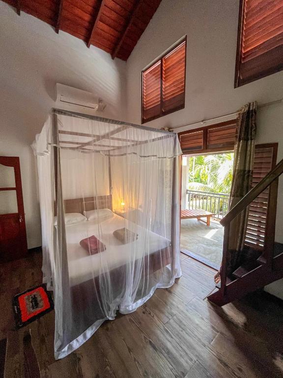 Letto o letti in una camera di Abraham Beach House