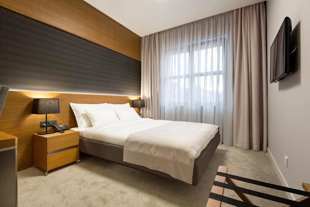 TV a/nebo společenská místnost v ubytování Hotel Orasac Garni