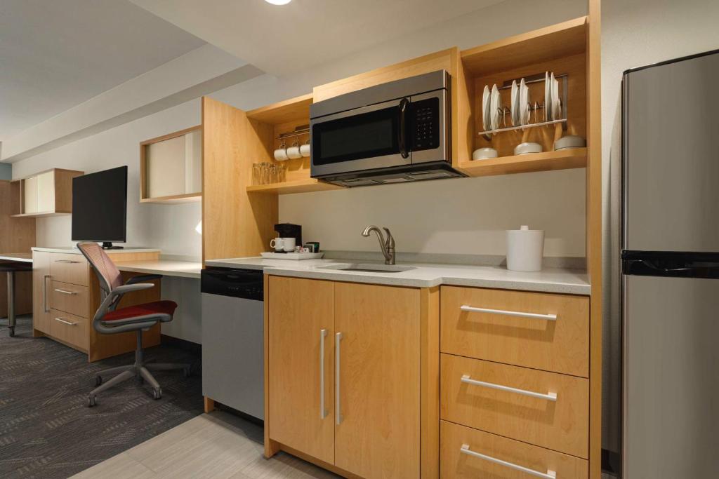 Kuchyň nebo kuchyňský kout v ubytování Home2 Suites by Hilton Austin North/Near the Domain, TX