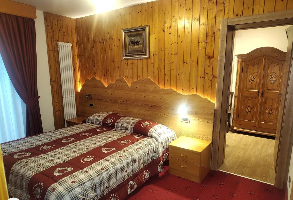 Postel nebo postele na pokoji v ubytování Hotel Orso Grigio