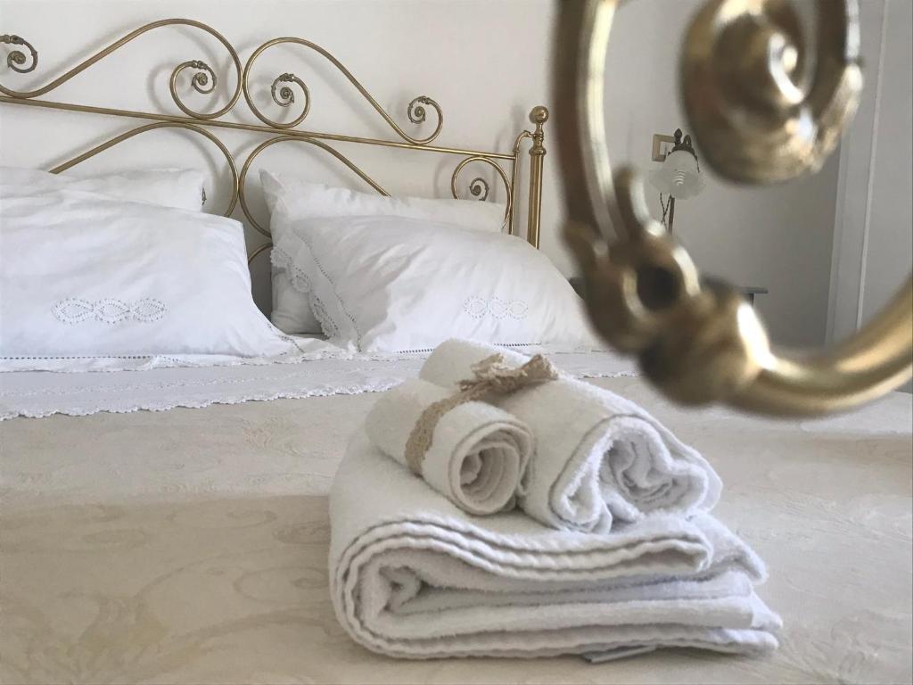 Postel nebo postele na pokoji v ubytování Gianmaria B&B