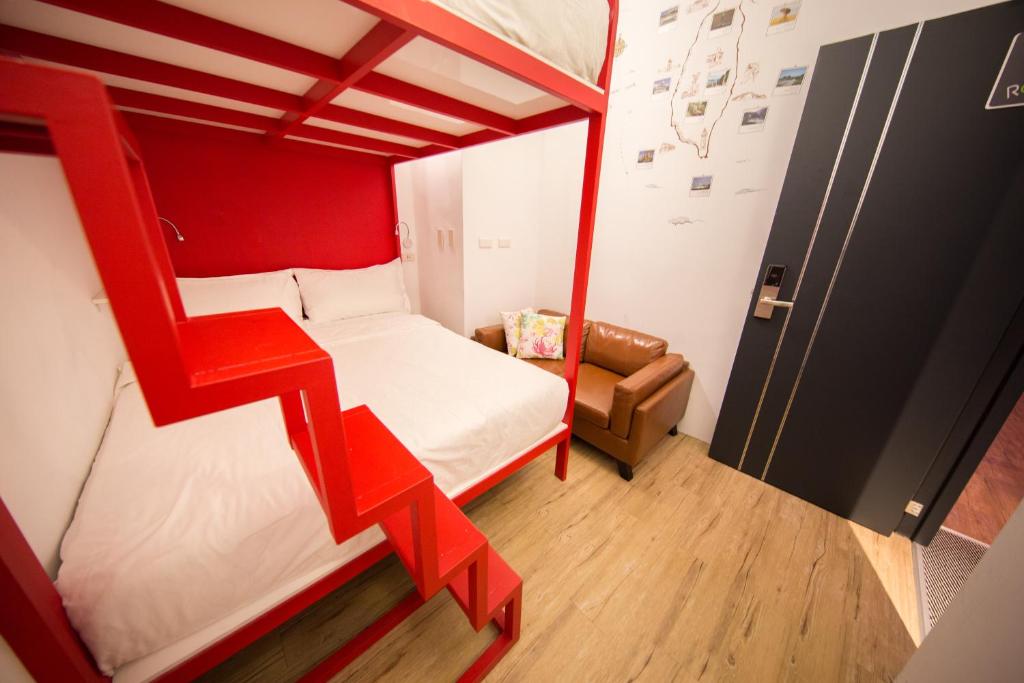 Postel nebo postele na pokoji v ubytování SleepBox Hostel