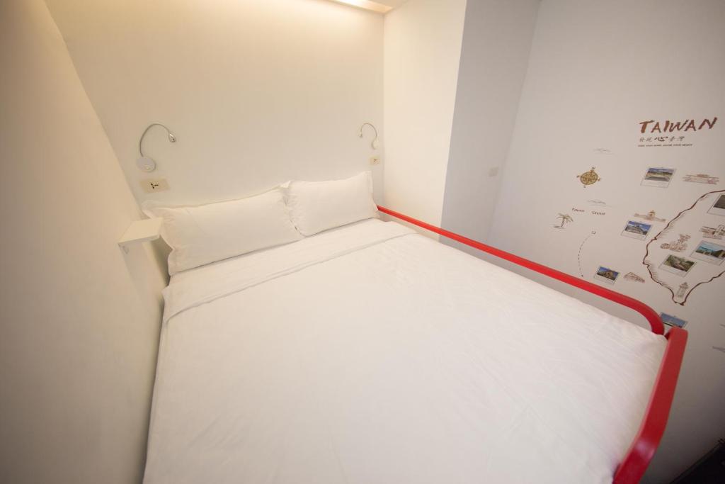 Postel nebo postele na pokoji v ubytování SleepBox Hostel