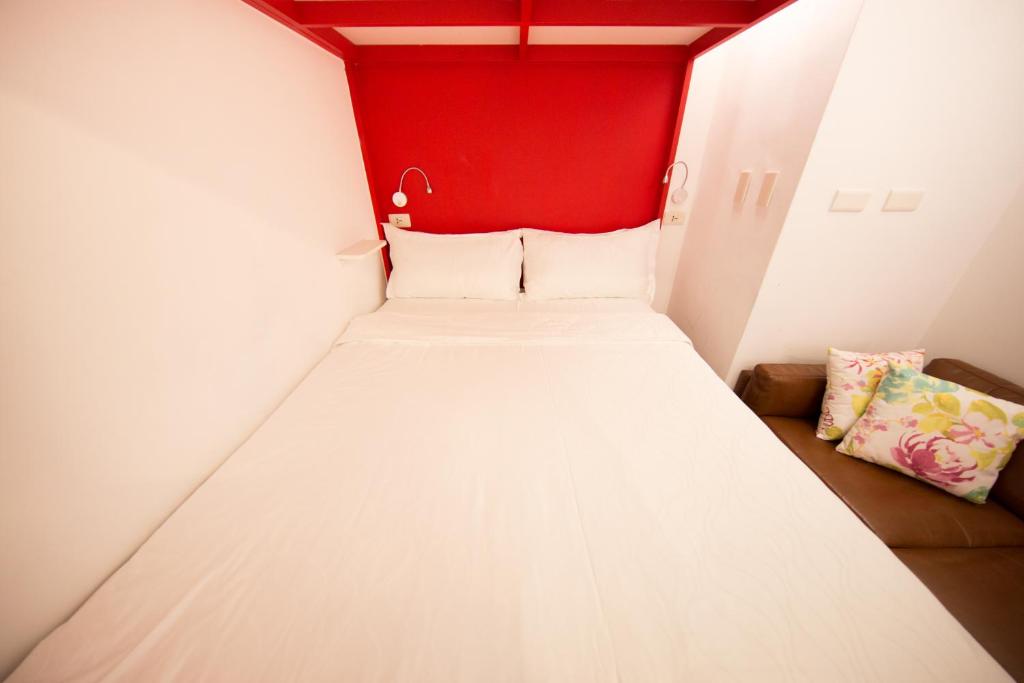 Postel nebo postele na pokoji v ubytování SleepBox Hostel