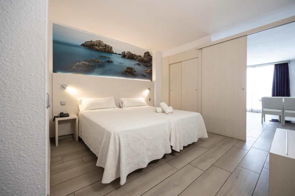 Postel nebo postele na pokoji v ubytování Aparthotel Miami Park