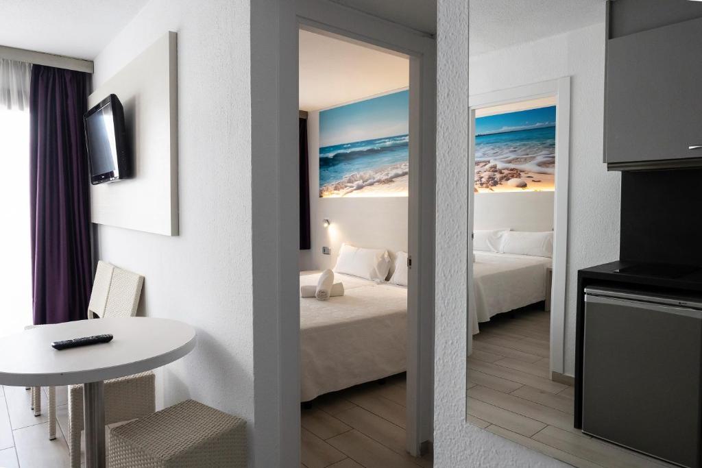 Postel nebo postele na pokoji v ubytování Aparthotel Miami Park