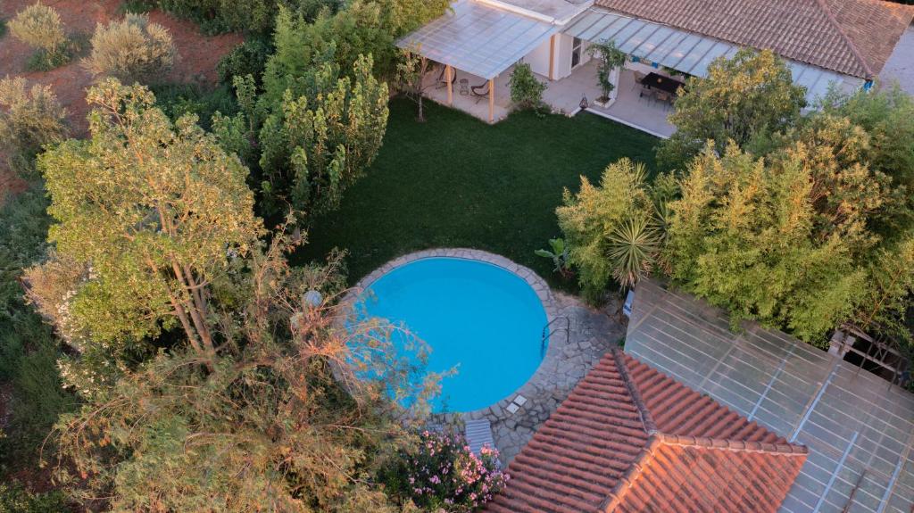 an overhead view of a swimming pool in a yard at Spacious House with Cottage&Pool in Nafplio