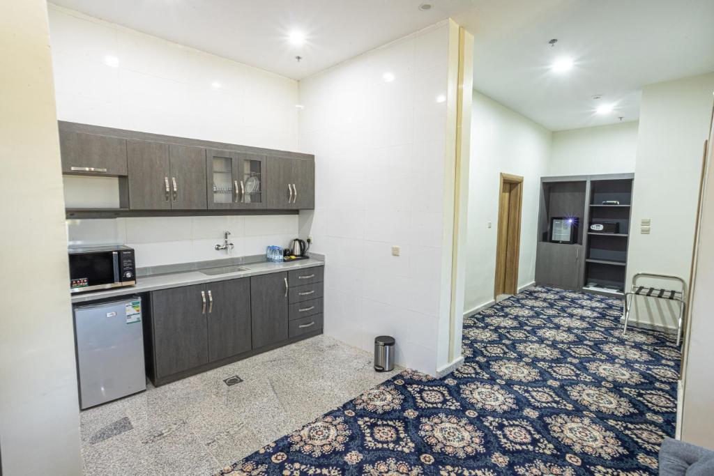 Kuchyň nebo kuchyňský kout v ubytování Vista Hotel Tabuk