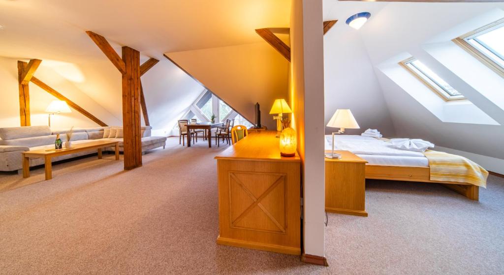 Postel nebo postele na pokoji v ubytování Hotel Sanatorium Mariot