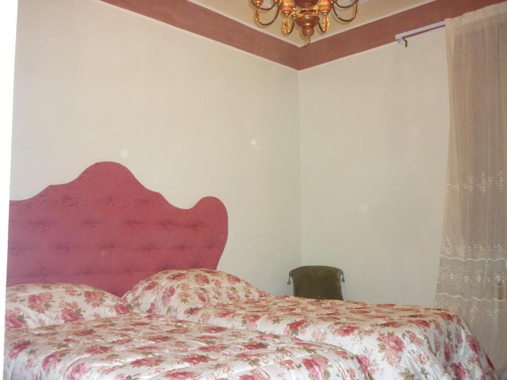 Łóżko lub łóżka w pokoju w obiekcie San Zanobi Apartment