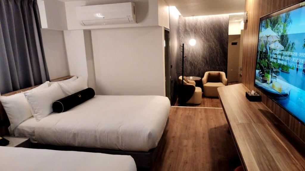 TV a/nebo společenská místnost v ubytování Jiati Business Motel