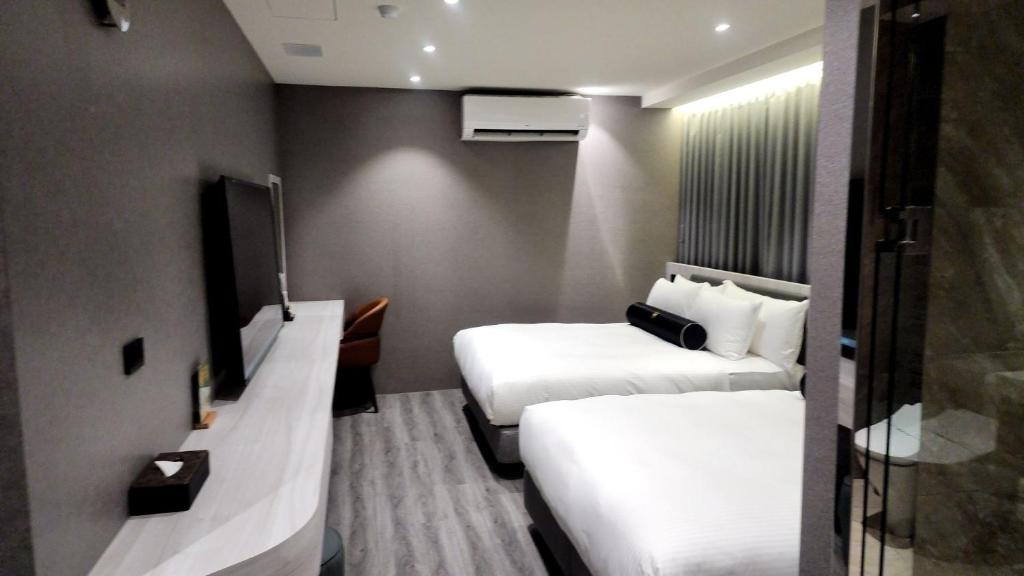 TV a/nebo společenská místnost v ubytování Jiati Business Motel