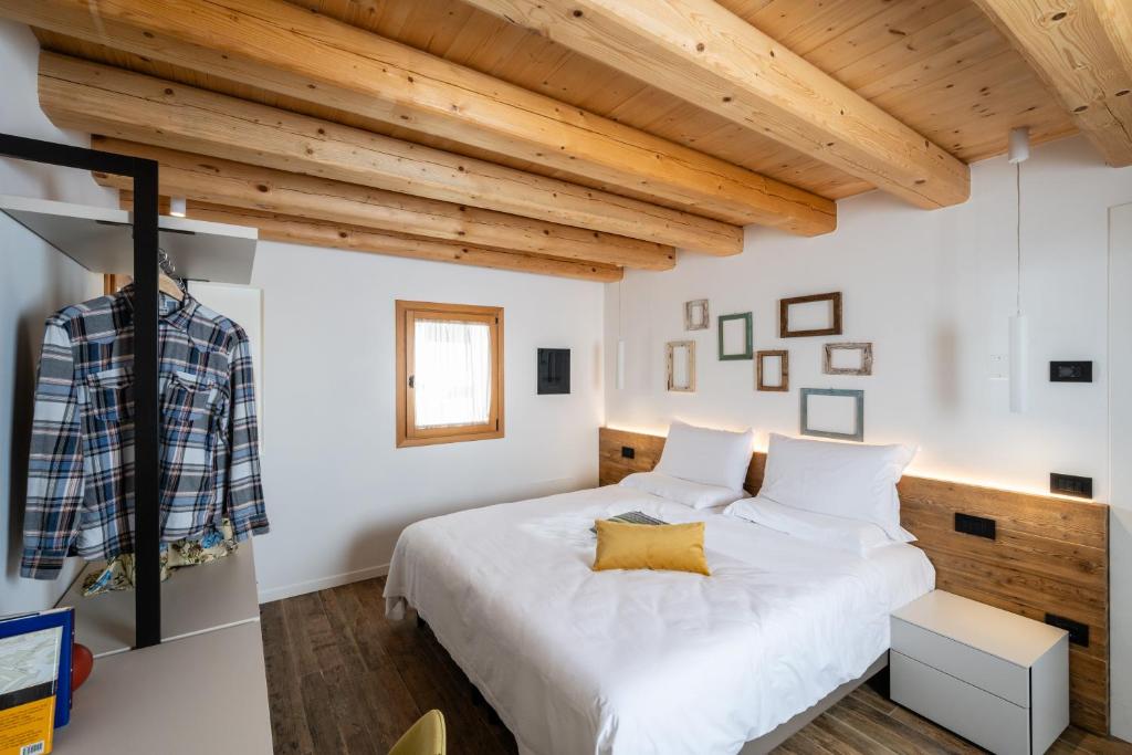 Postel nebo postele na pokoji v ubytování Borgo Paolin - Camere in vigna