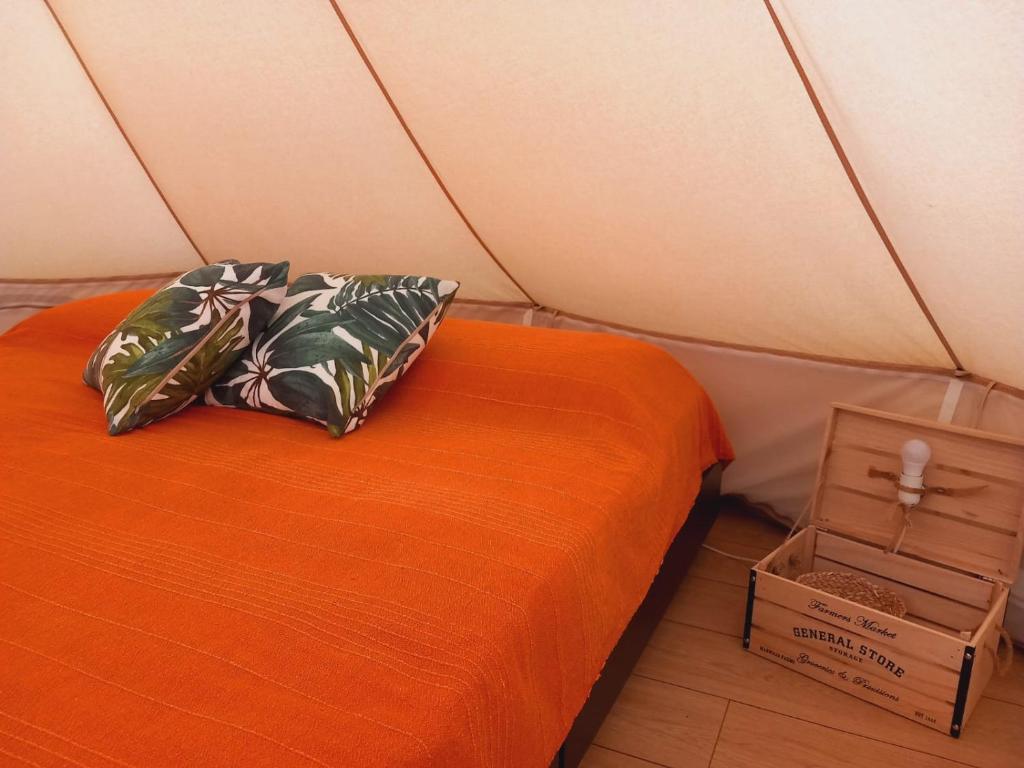 Postel nebo postele na pokoji v ubytování Shangri-La Base Camp Costa Rei