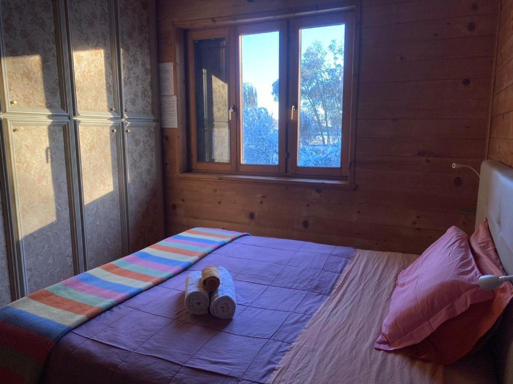 A bed or beds in a room at B&B Villa Letizia