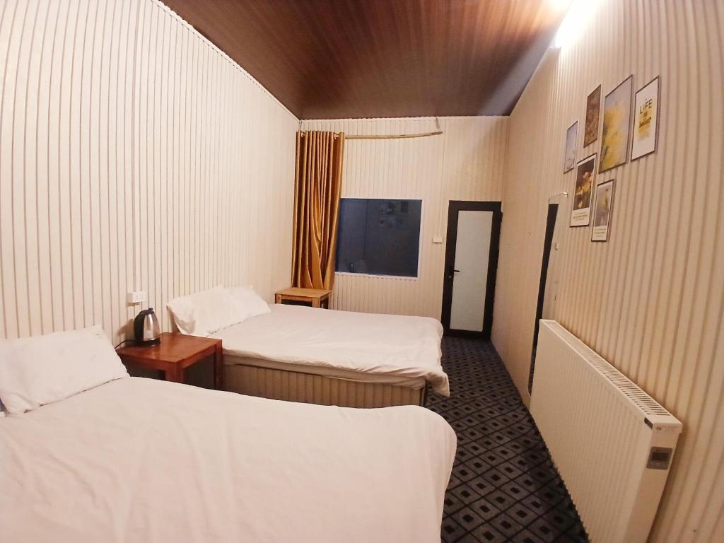 Postel nebo postele na pokoji v ubytování Tà Xùa Casablanca Homestay