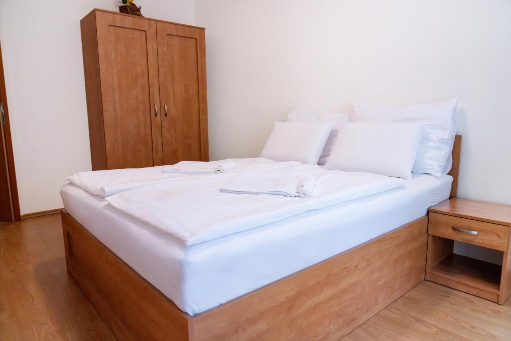 Postel nebo postele na pokoji v ubytování Gizela