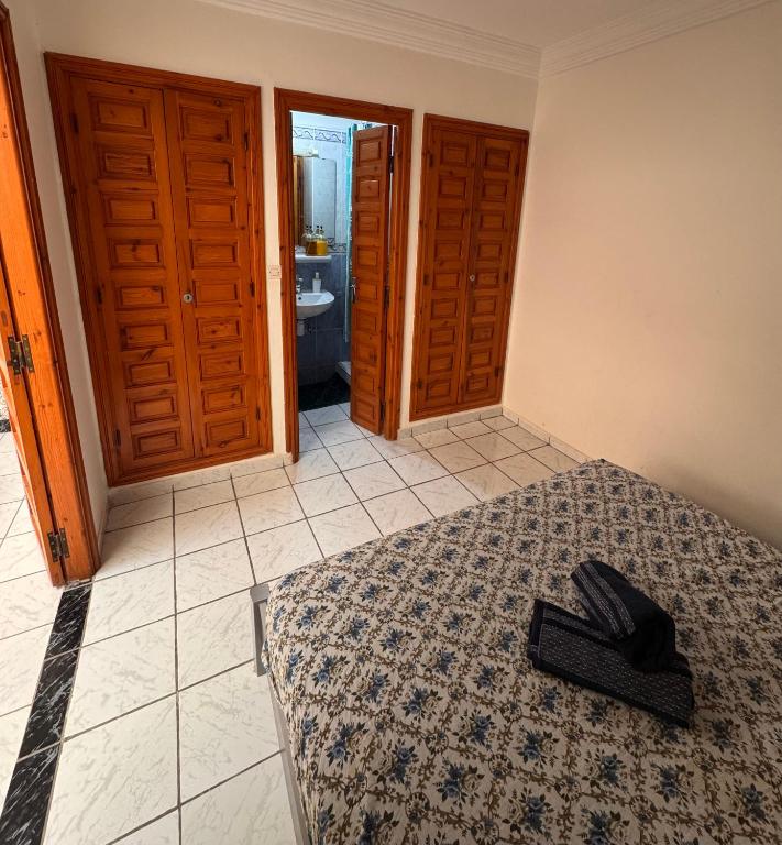 Postel nebo postele na pokoji v ubytování Riad Naïel 3 piscines