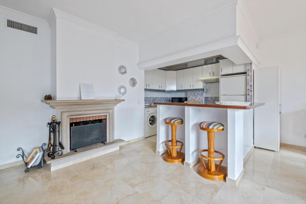 Kuchyň nebo kuchyňský kout v ubytování Spacieux appartement à Marbella