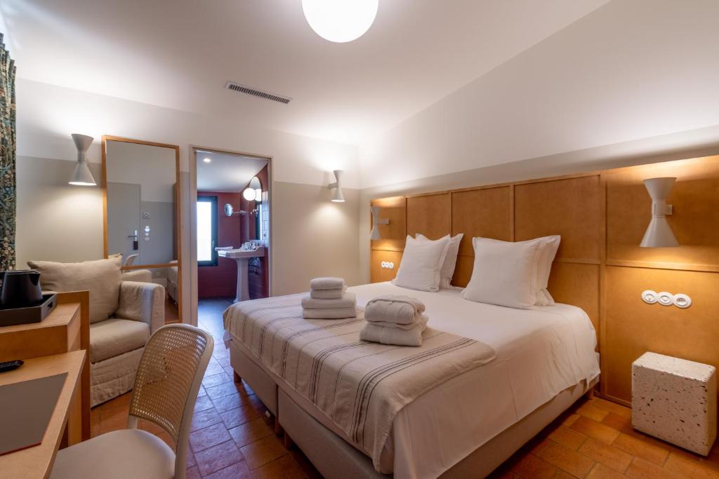 Postel nebo postele na pokoji v ubytování Hôtel Restaurant Villa Joséphine