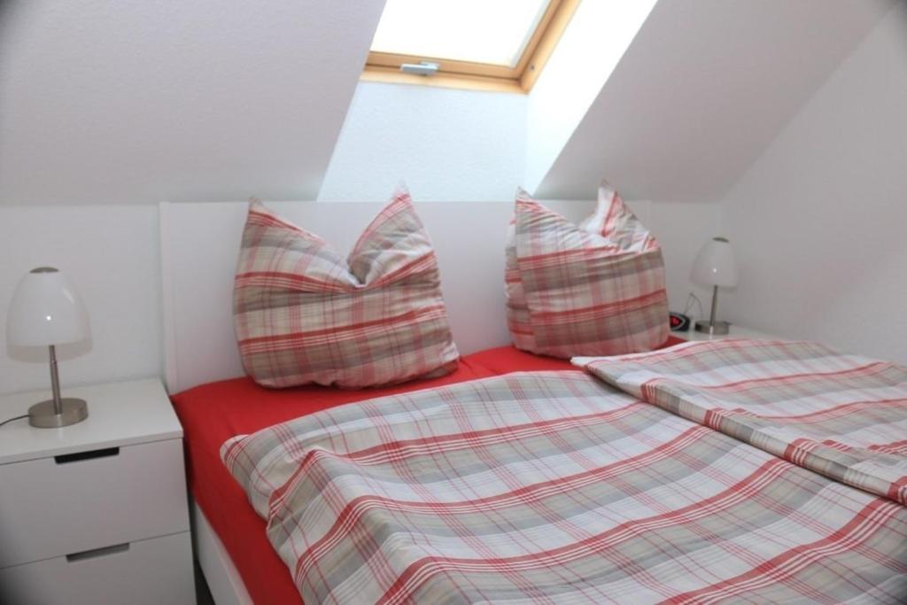 Postel nebo postele na pokoji v ubytování Wohnung 11