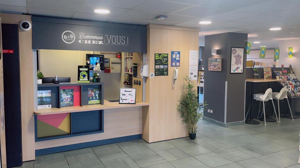Certifikát, hodnocení, plakát nebo jiný dokument vystavený v ubytování B&B HOTEL Creil Chantilly