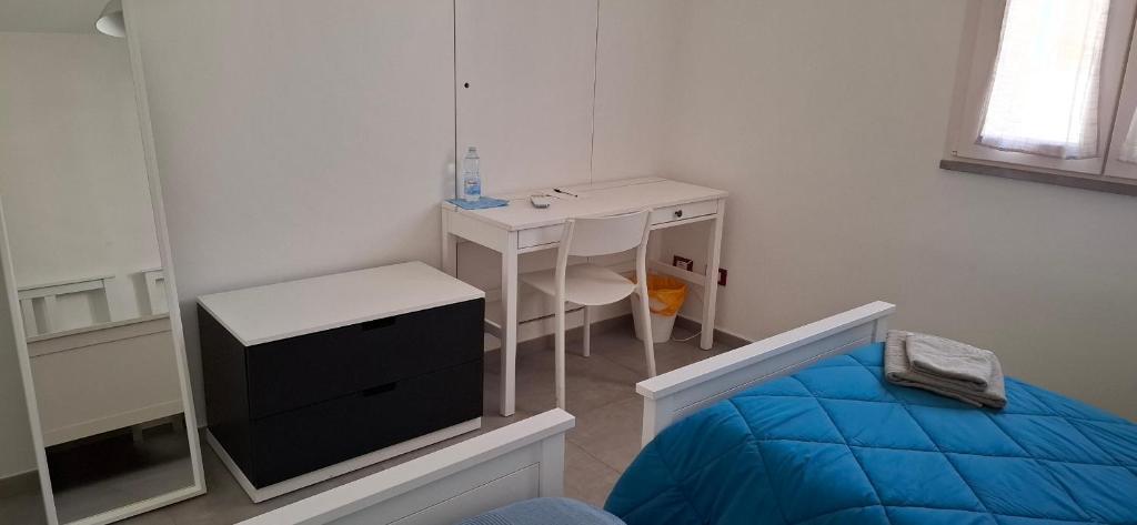 Postel nebo postele na pokoji v ubytování Al Cortile Tranquillo