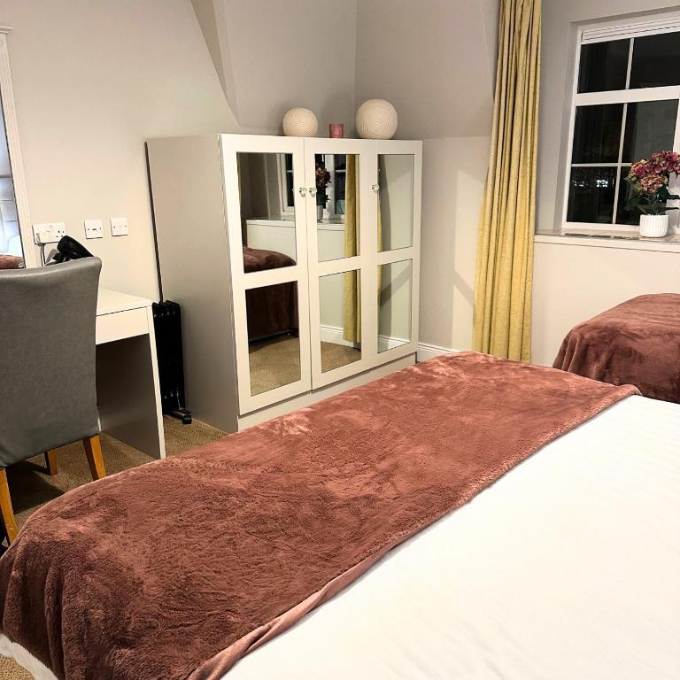 Postel nebo postele na pokoji v ubytování Spacious 2 bedroom apartment in Killarney