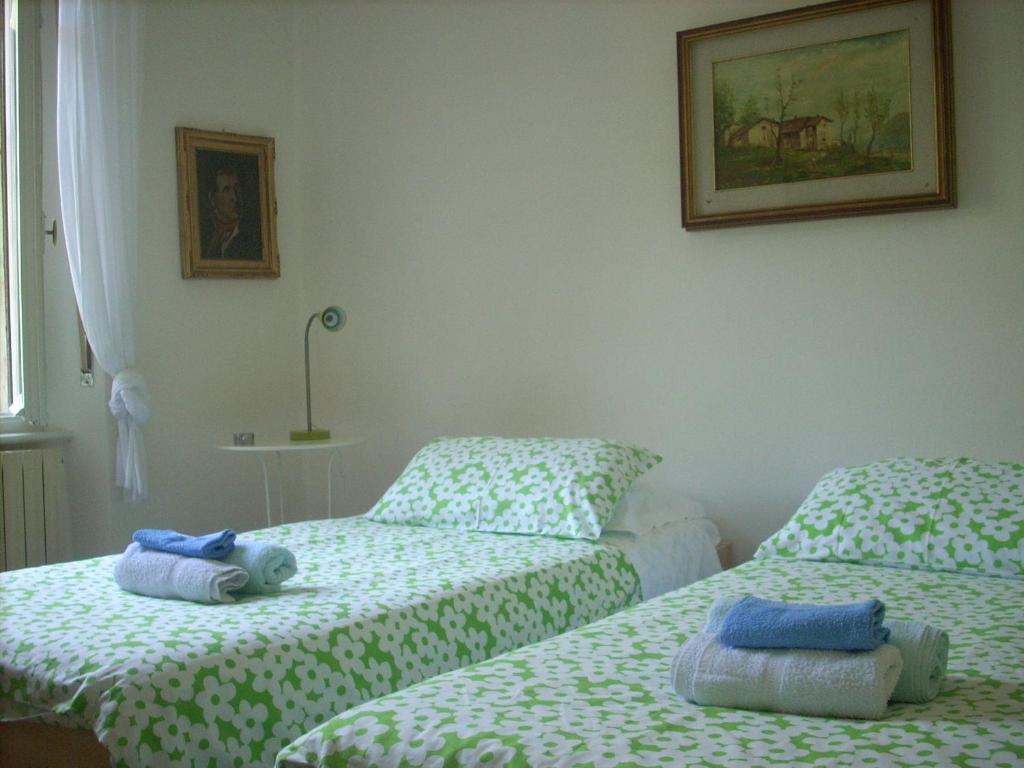 Postel nebo postele na pokoji v ubytování B&B I Ghiri