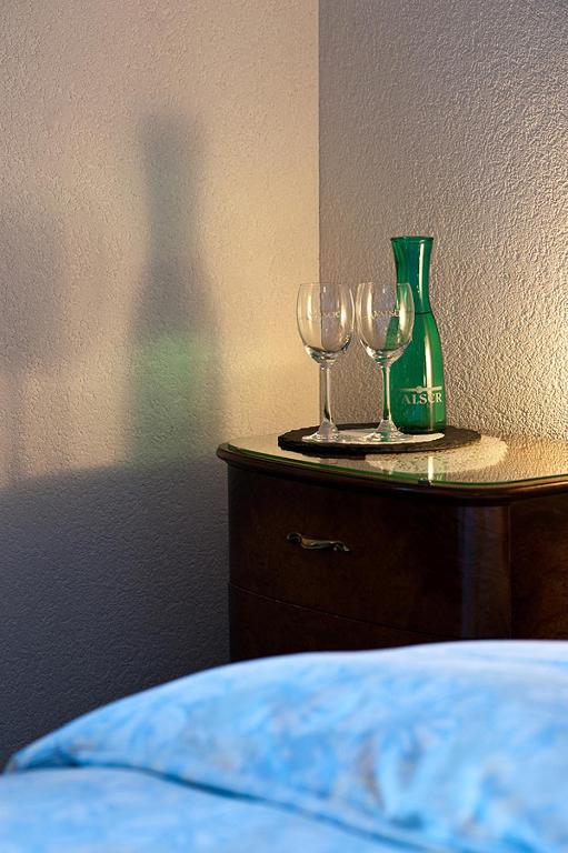 Postel nebo postele na pokoji v ubytování La Vallée Hôtel &Spa