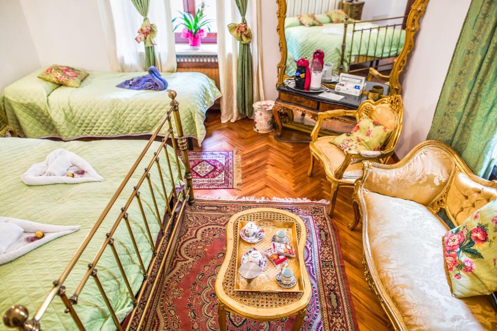A bed or beds in a room at Art&Coffee