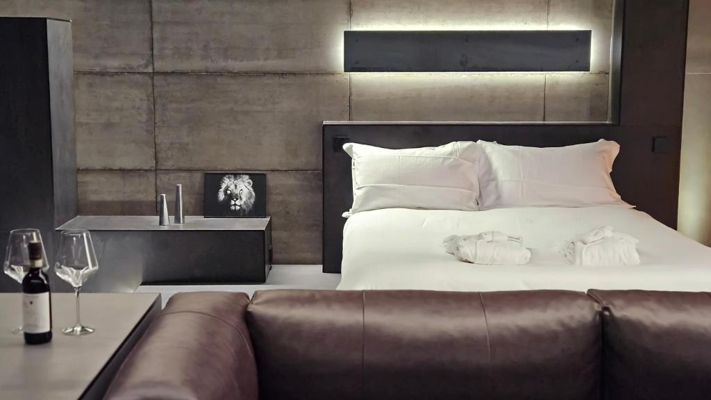 Postel nebo postele na pokoji v ubytování Agarthi Suites - Valtellina