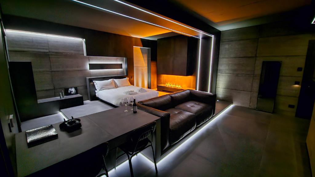 Postel nebo postele na pokoji v ubytování Agarthi Suites - Valtellina