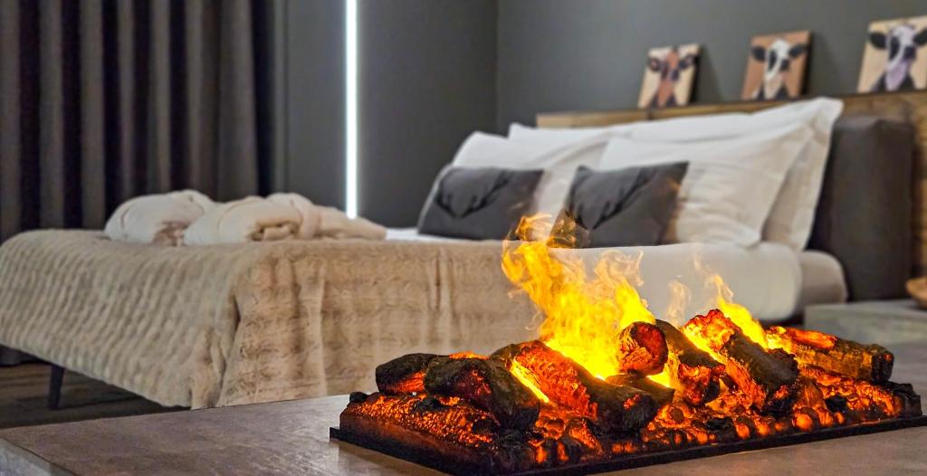 Postel nebo postele na pokoji v ubytování Agarthi Suites - Valtellina