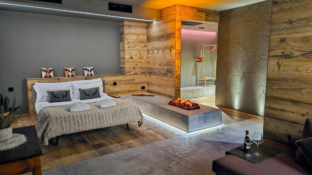 Postel nebo postele na pokoji v ubytování Agarthi Suites - Valtellina