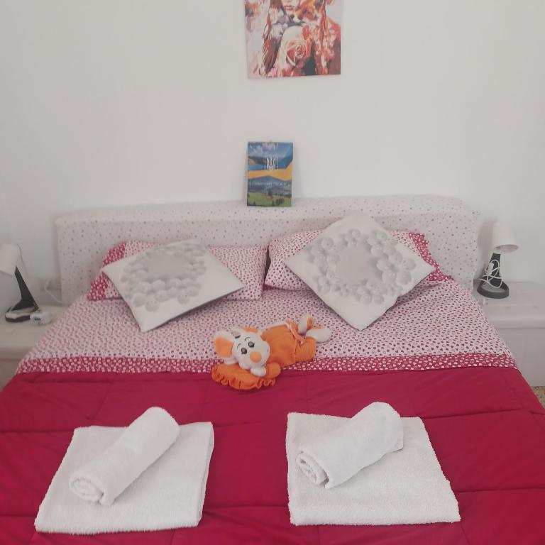 Posteľ alebo postele v izbe v ubytovaní B&B Appartamenti NAPOLI