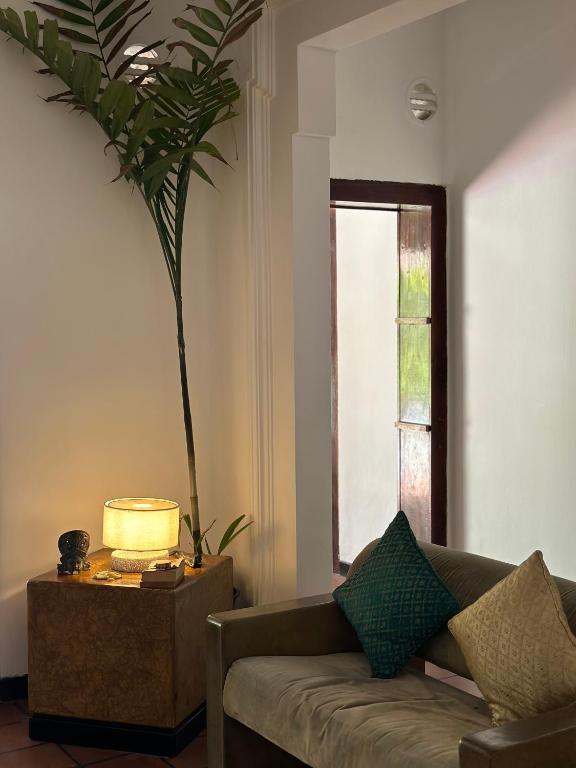 Posezení v ubytování Mango Tree Villa
