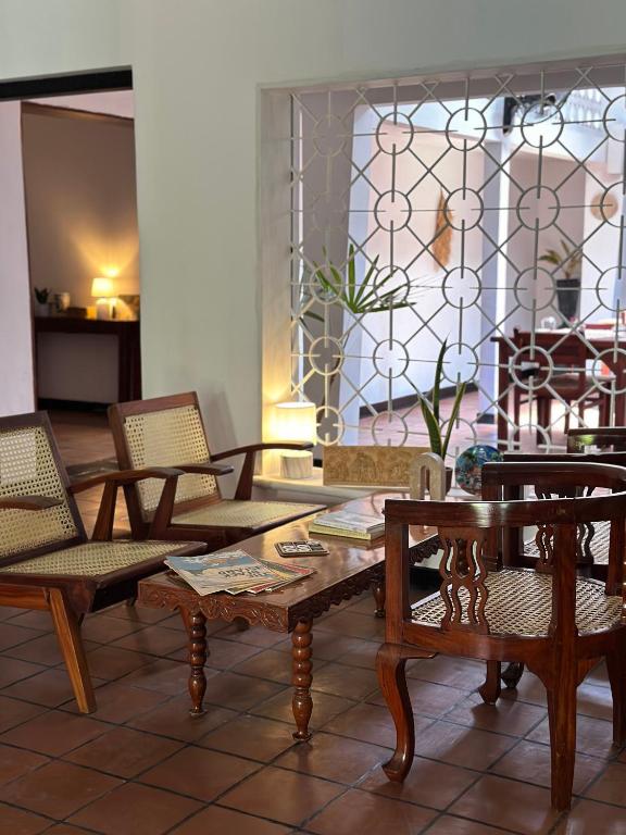 Posezení v ubytování Mango Tree Villa