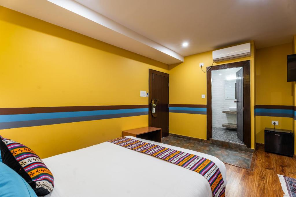 Postel nebo postele na pokoji v ubytování Hotel Yukhang