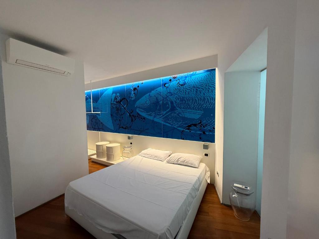 Postel nebo postele na pokoji v ubytování Mare Mosso 2