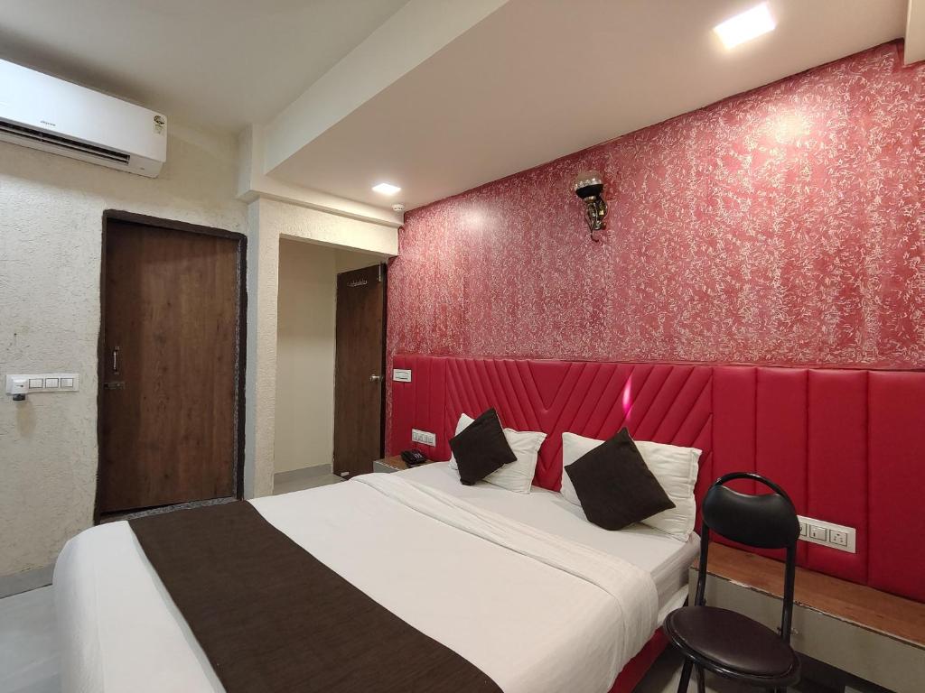 Postel nebo postele na pokoji v ubytování Hotel Avadh Palace, Subhash Bridge, RTO Circle, Ahmedabad