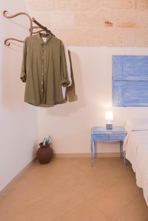 Łóżko lub łóżka w pokoju w obiekcie A Casa di Lavinia