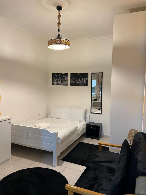 Postel nebo postele na pokoji v ubytování Sunset Studio