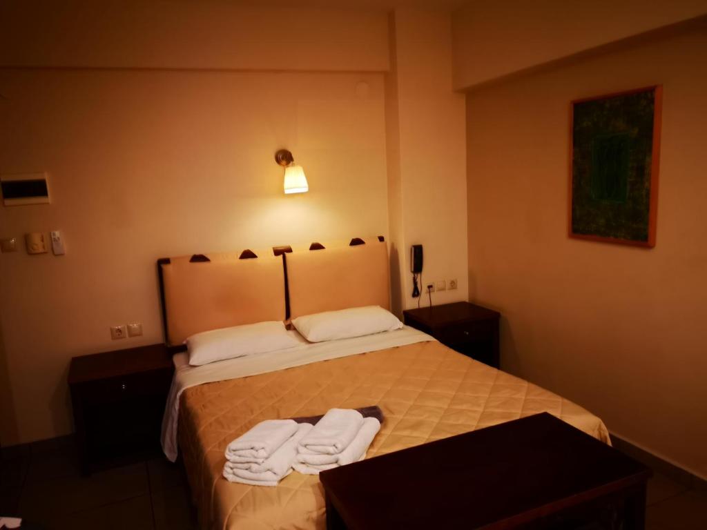 Postel nebo postele na pokoji v ubytování Hotel Ioanna