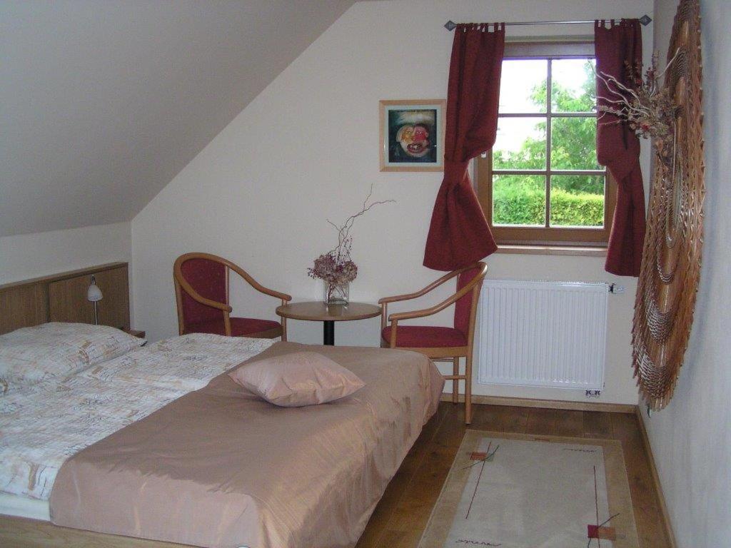 Postel nebo postele na pokoji v ubytování Apartment 53 Zvíkovské Podhradí