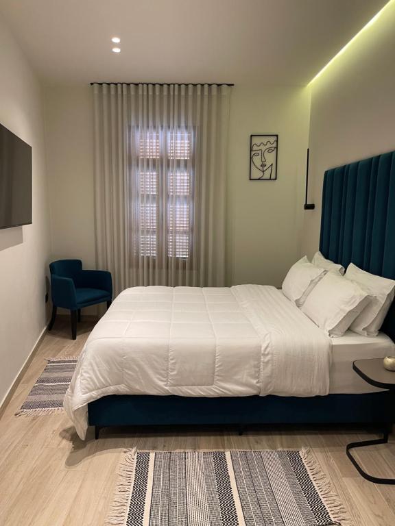 Postel nebo postele na pokoji v ubytování The cosy inn vlora