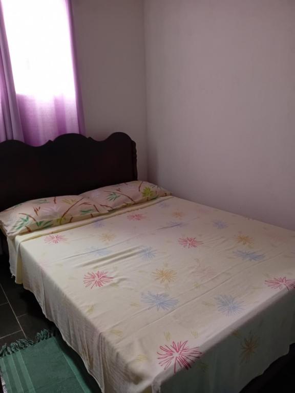 Postel nebo postele na pokoji v ubytování Hospedagem dona Alaide